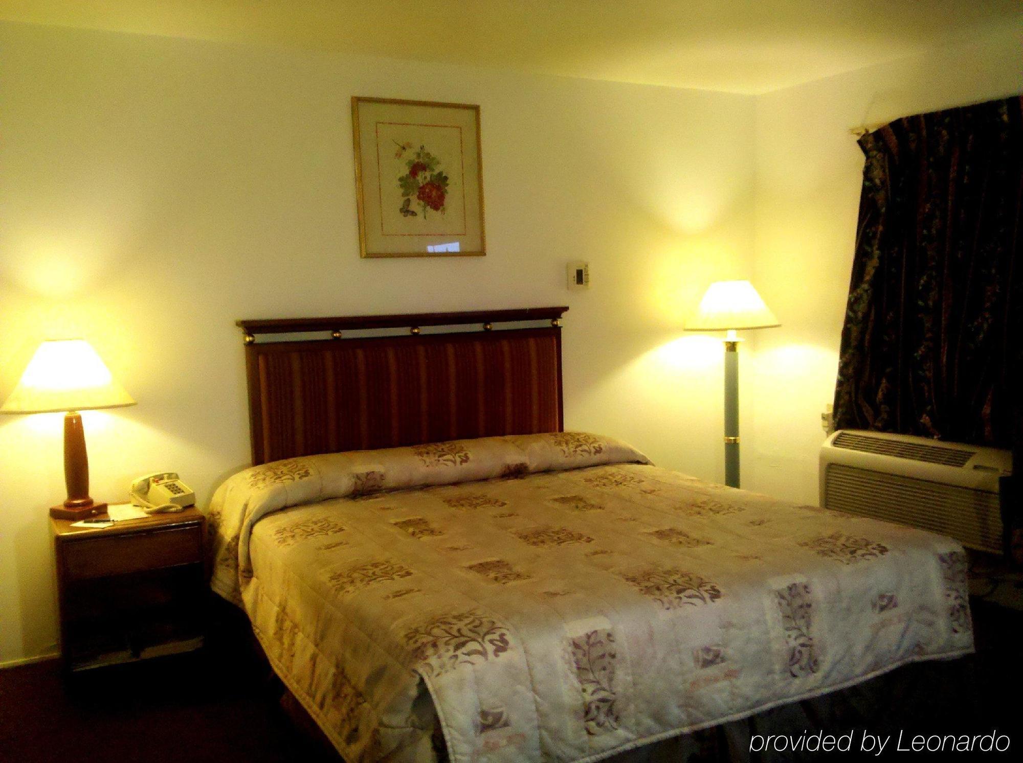 Maple Inn And Suites Los Banos Quarto foto