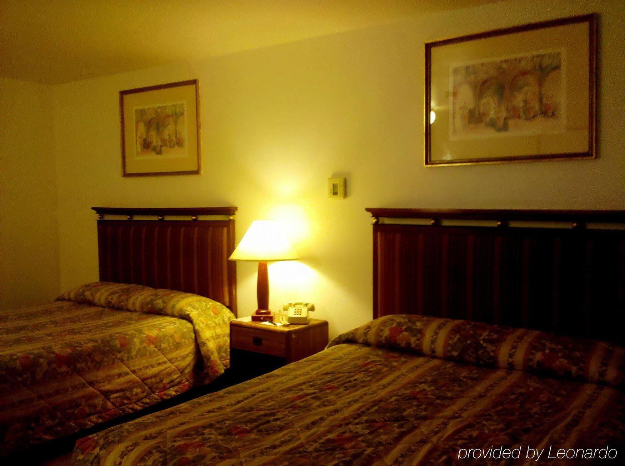 Maple Inn And Suites Los Banos Quarto foto